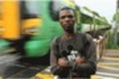 Hero stops suicidal girl being hit by train